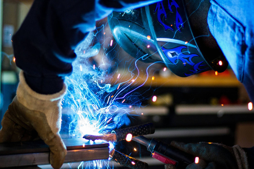 Man welding- photo from Rob Lamber on Unsplash